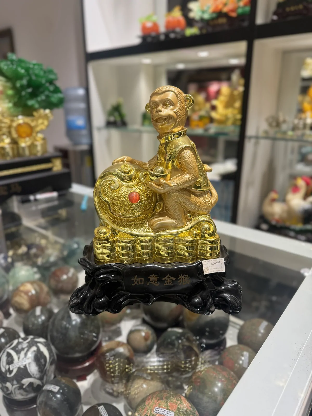 Khỉ tài lộc trên như ý - như ý kim hầu K045M
